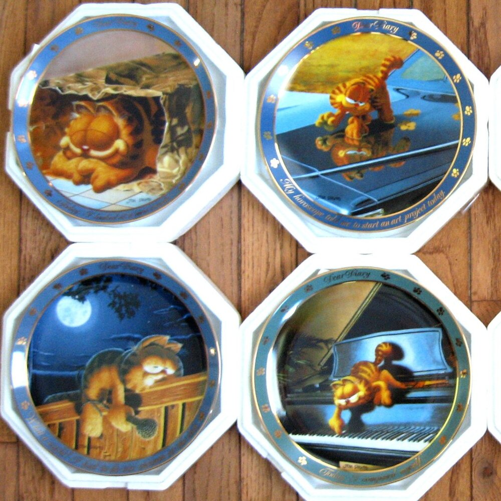 Garfields Dear Diary 8 plate collection by the Danbury Mint .